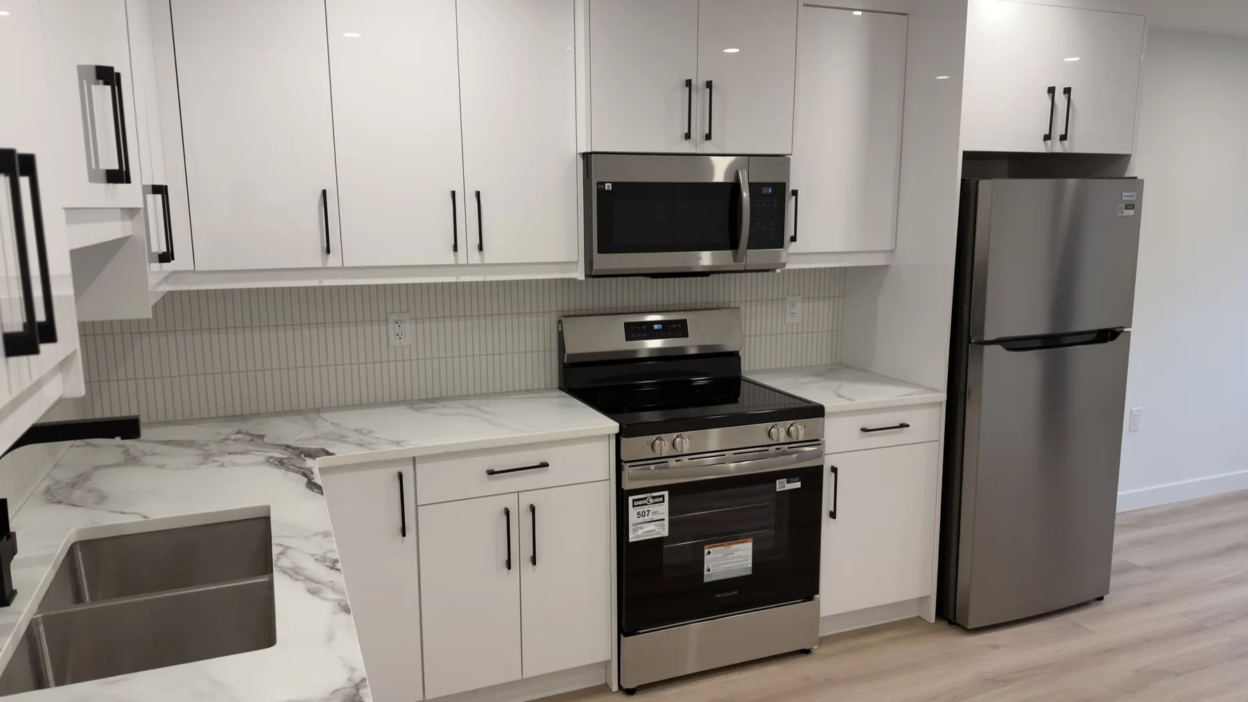 Finished suite kitchen, marble counters and full size appliances